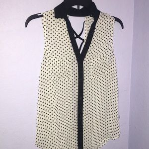 Sleeveless polka dot blouse
